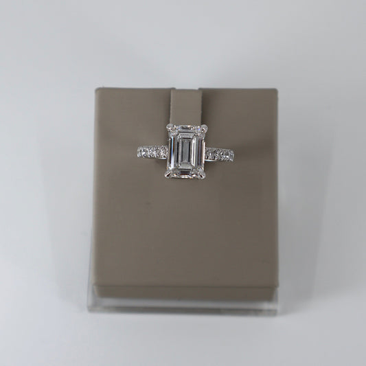LAB GROWN 14 KW 4.02CT EMERALD CUT E/VS1 WITH 12 ROUND DIAMONDS .45CTW ON SIDES LABDRCD817