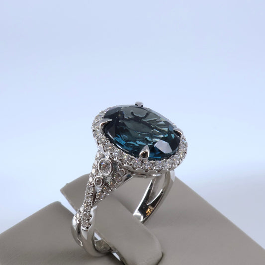 18KW .52CTW 62 ROUND DIAMOND HALO / 5.64CT OVAL LONDON BLUE TOPEZ RING DRCM4513