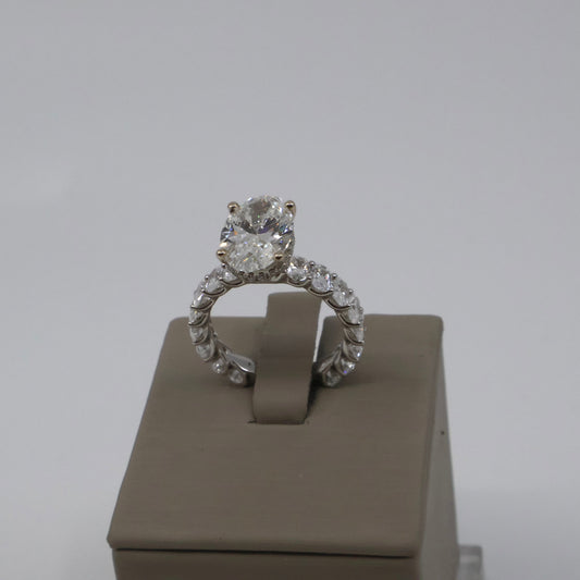 LAB GROWN 18KW HIDDEN HALO DIAMOND RING 3.15CT OVAL F/VS1 (GIA CERTIFIED) .28CTW ROUND DIAMOND HALO AND 16 OVAL DIAMONDS 2.36CTW LABDRCD705