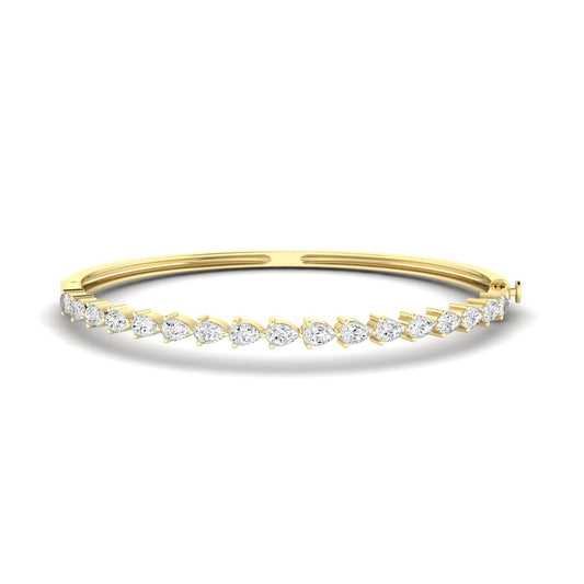 14K Gold East West Pear Bangle Bracelet