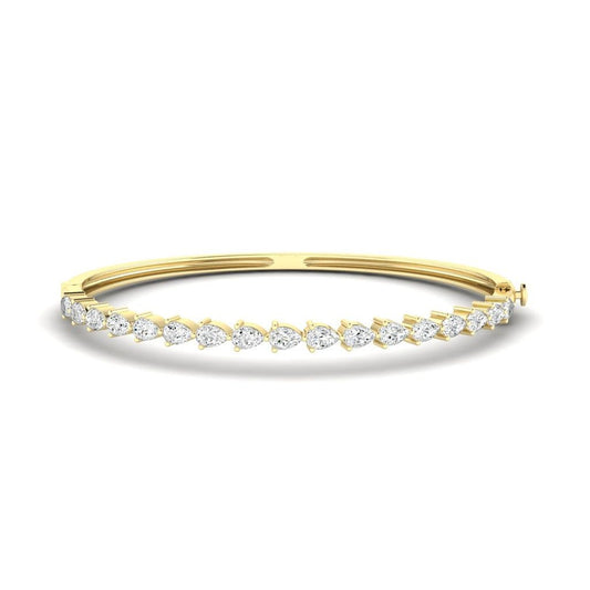 14K Gold East West Pear Bangle Bracelet
