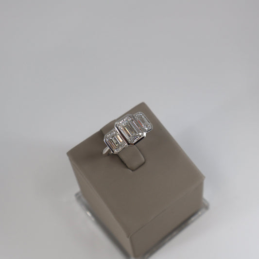 LAB GROWN 14KW 2.04 CT EMERALD CUT CENTER DIAMOND / 2.07 CTW EMERALD ON EACH SIDE BEZEL SET 2 STONE RING LABDRCD804