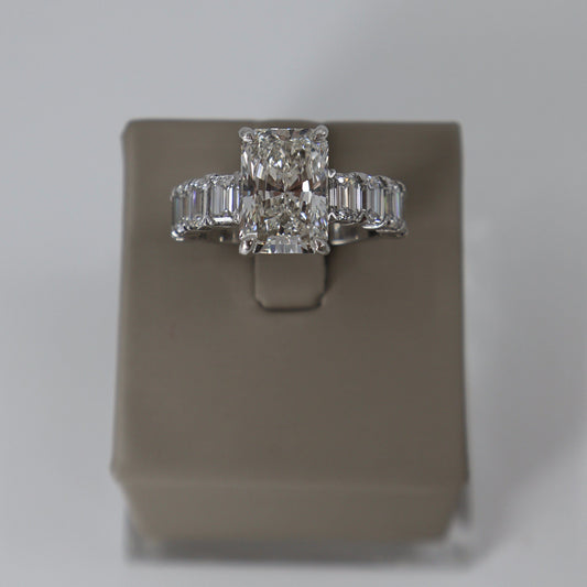 LAB GROWN PLATINUM 4.52CT EMERALD CUT CENTER WITH 8 EMERALD CUT 2.51CTW RING OTC11593