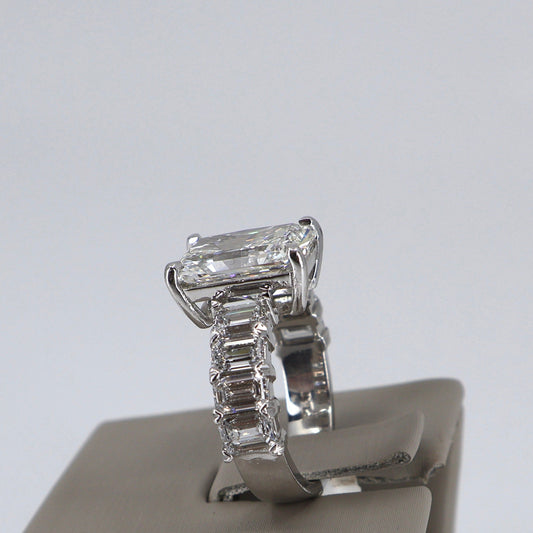 LAB GROWN PLATINUM 4.52CT EMERALD CUT CENTER WITH 8 EMERALD CUT 2.51CTW RING OTC11593