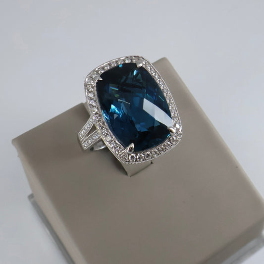 18KW .57CTW 70 ROUND DIAMOND / 14.28CT CUSHION CUT LONDON BLUE TOPEZ RING SRG20433
