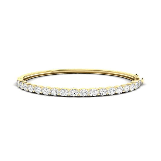 14K Gold East West Oval Bangle Bracelet